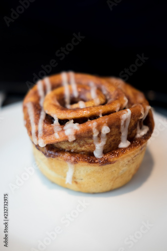 Pumpkin cinnamon rolls with icing drizzle