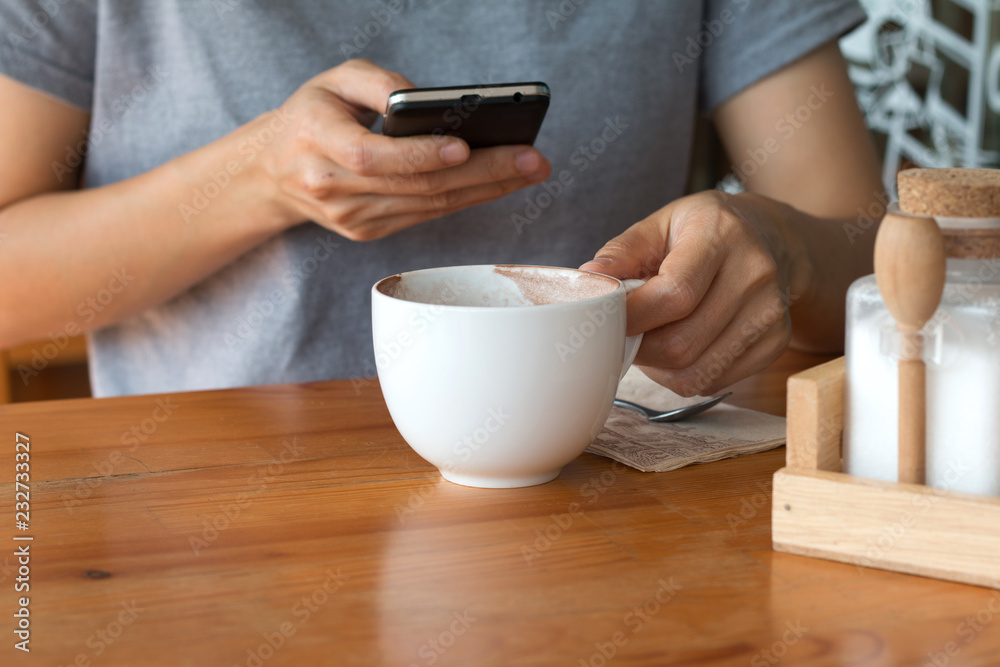 Woman enjoying warming drink, Late coffee in a cup Woman enjoying warming drink, Late coffee in a cup