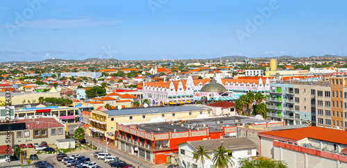 Oranjestad, Aruba. View from above of colourful buildings in Oranjestad on the island of Aruba. Blue sky day. photo