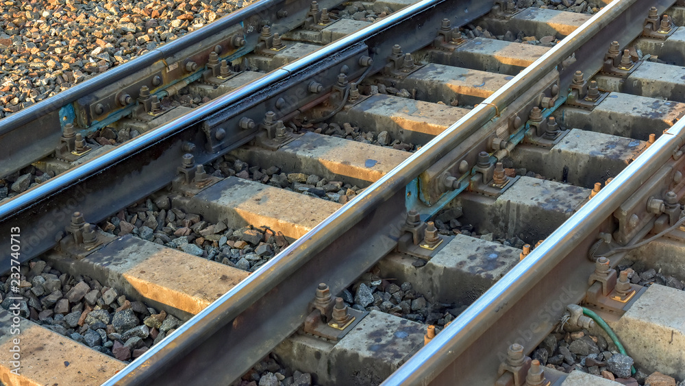 Close-up of details of railway tracks junction Close-up of details of railway tracks junction