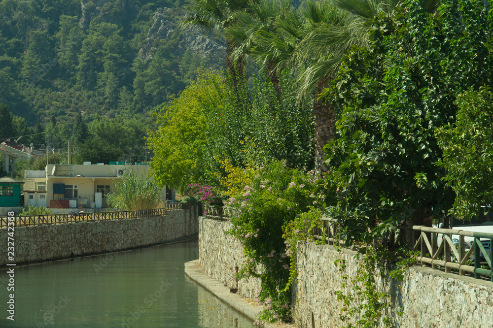 Garden in the mountain village with the river