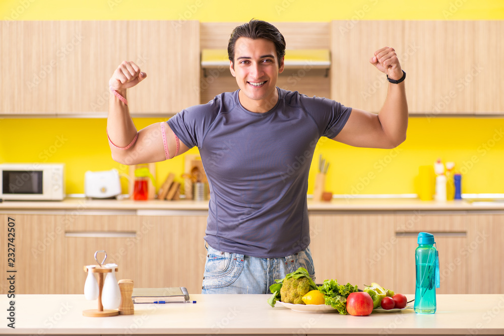 Young man in dieting and healthy eating concept Young man in dieting and healthy eating concept