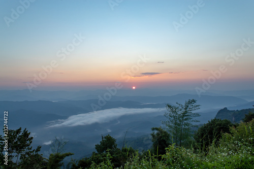 Fog and sun Morning after mountain at Phu Soi Dao National Park, Uttaradit in Thailand.