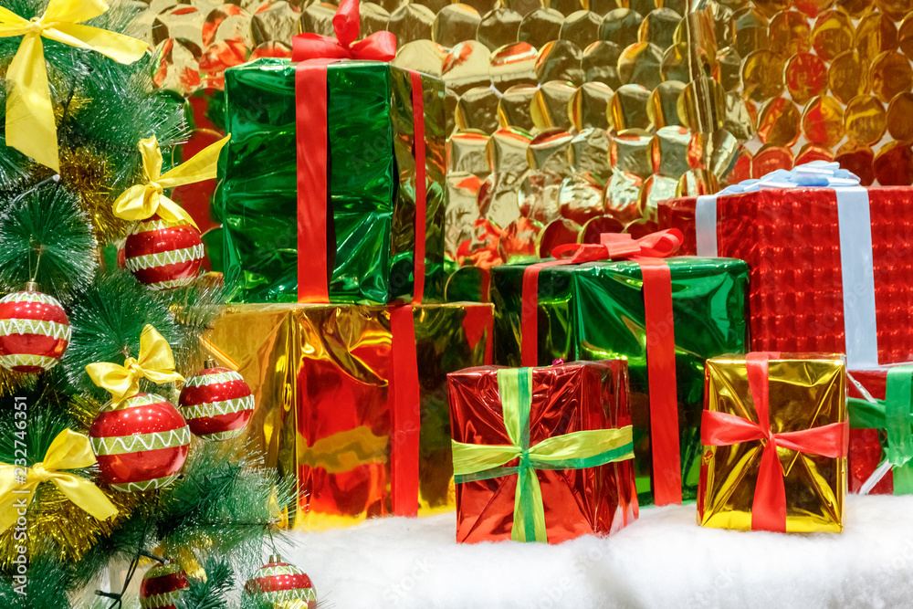 Christmas tree on the background of many Christmas gifts. Christmas tree on the background of many Christmas gifts.