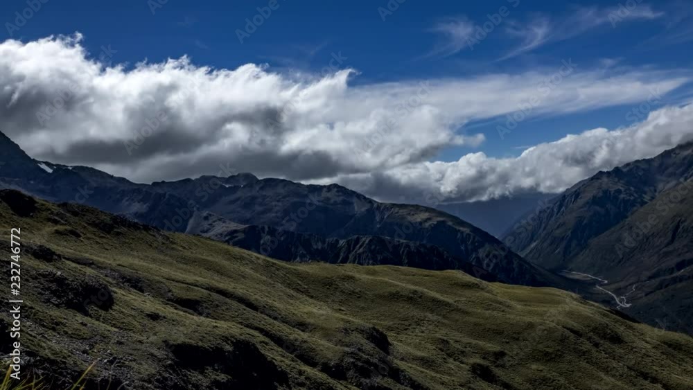 Souther Alps in Arthurs Pass from Avalanche Peak. Beautiful mountainous landscape of New Zealand in timelapse video. Souther Alps in Arthurs Pass from Avalanche Peak. Beautiful mountainous landscape of New Zealand in timelapse video.
