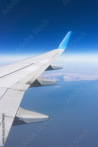 Flight over blue sea