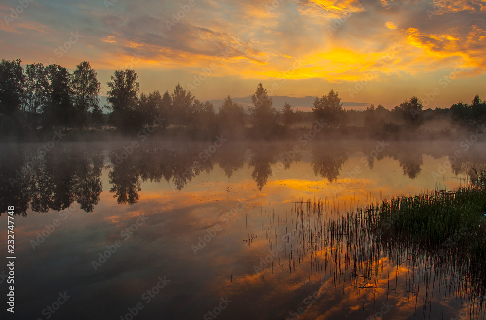 Fototapeta premium sunset over the lake