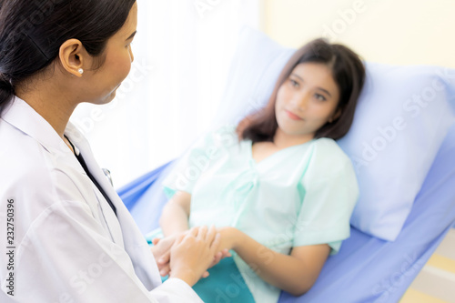 medical doctor hold patient hand