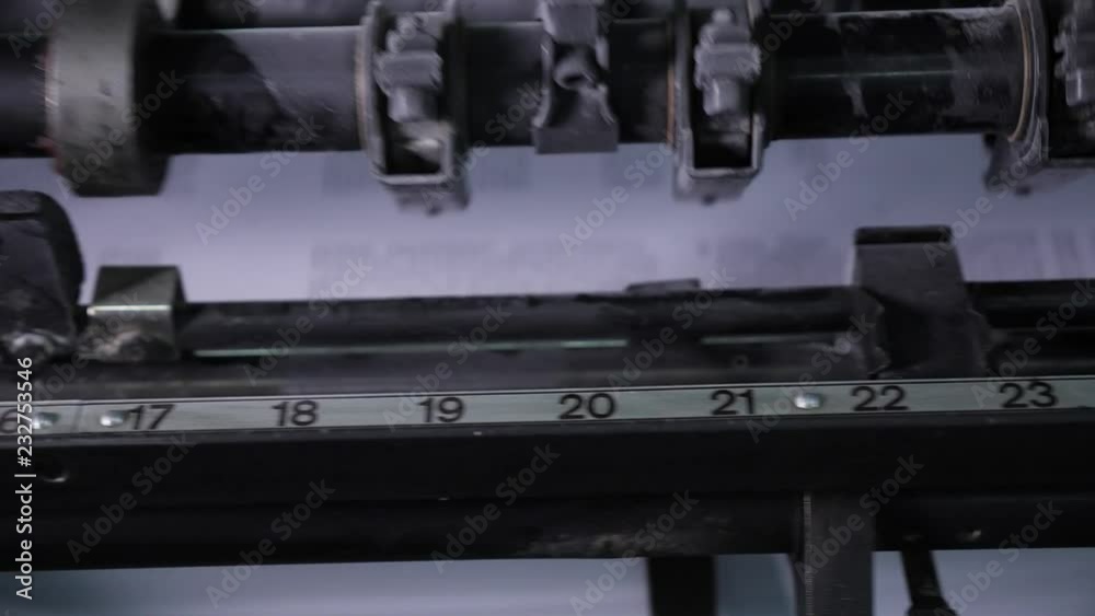 The work of a professional printing press in the printing house. The