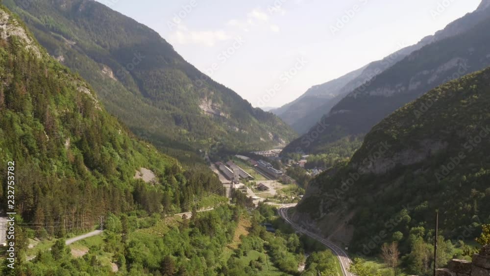 Time-lapse of the valley with Canfranc International railway station in the Spanish Pyrenees -wide shot Time-lapse of the valley with Canfranc International railway station in the Spanish Pyrenees -wide shot