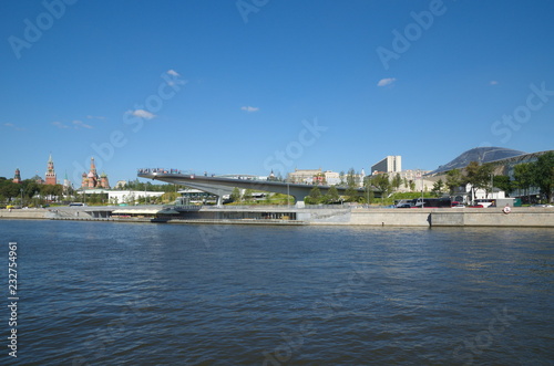 Moscow, Russia - August 24, 2018: Summer view on Moskvoretskaya embankment and a "Floating bridge" in the natural-landscape Park "Zaryadye"