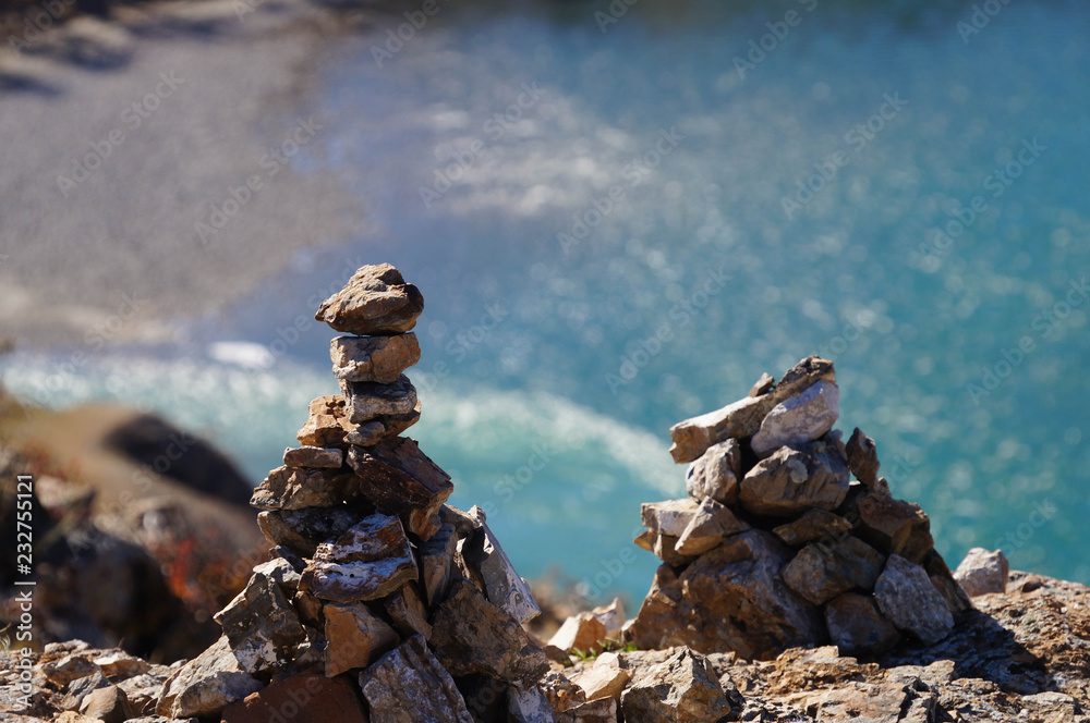 Stone pyramids at Confluence of Chuya and Katun rivers,Altai, Russia.