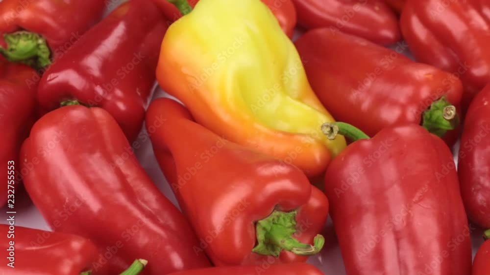 Close-up. The rotation of the background made from peppers. Close-up. The rotation of the background made from peppers.