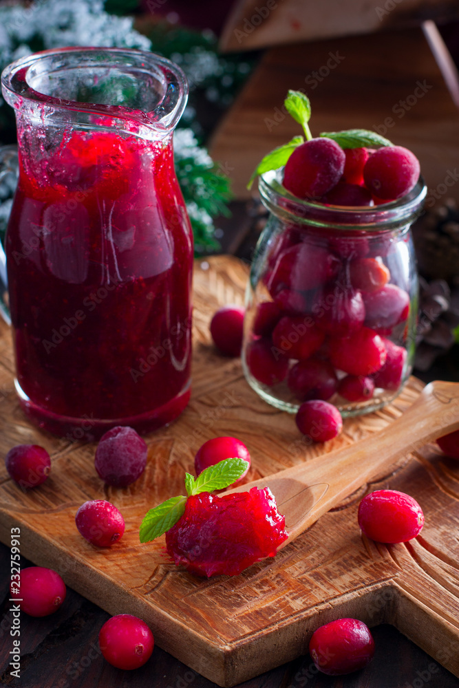 Cranberry Sauce on a wooden board, selective focus Cranberry Sauce on a wooden board, selective focus