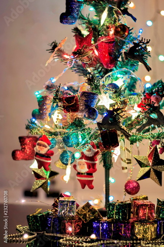Christmas tree with decorative lighting and beautiful accessories.