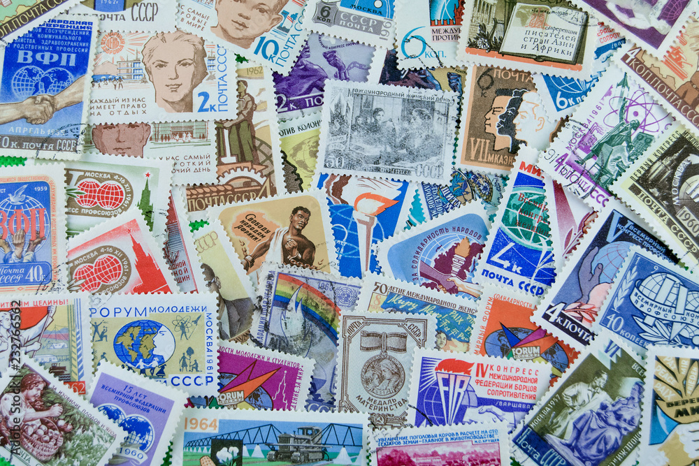 Postage stamps of different countries and times. Background.