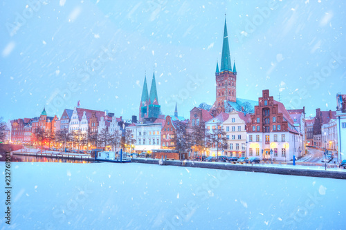 Frozen Trave river and embankment at winter time. Lubeck.