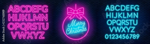 Neon sign merry christmas on a dark background with bright alphabets.