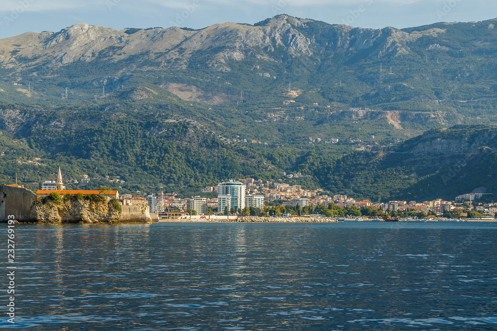 View of the mountains and the resort town of Budva in Montenegro from the sea