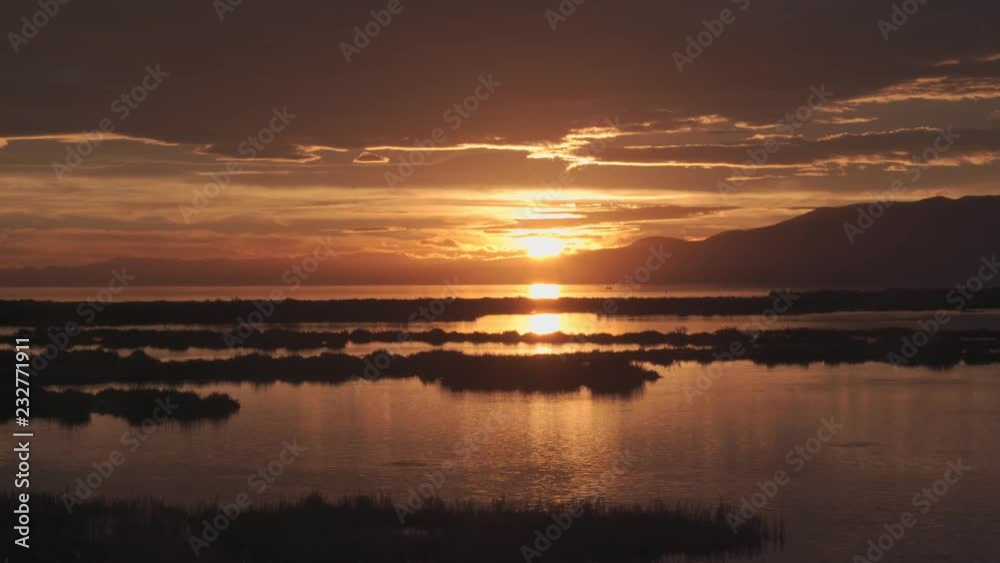 Golden hour in Sunset or sunrise over the Ebro delta in Catalonia, Spain. Golden hour in Sunset or sunrise over the Ebro delta in Catalonia, Spain.