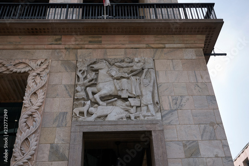 Fotografia Milano, Italy - September 19, 2018 : Details of Arengario Palazzo, bas-relief by