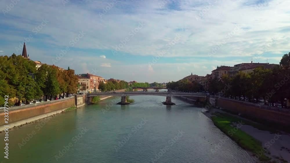 Panoramic aerial drone view of medieval city of love Verona, Pietra bridge and Adige river Panoramic aerial drone view of medieval city of love Verona, Pietra bridge and Adige river