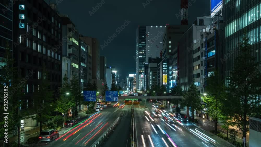 Timelapse shot of traffic and office buildings at night, Tokyo, Japan Timelapse shot of traffic and office buildings at night, Tokyo, Japan