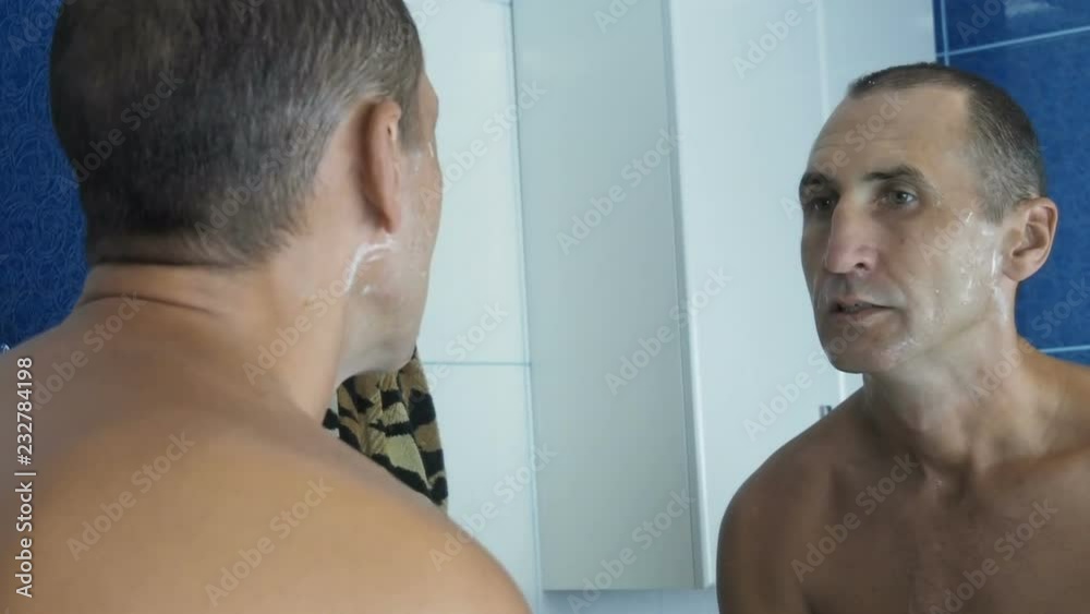 Morning treatments. The man washes. Morning treatments. The man washes.