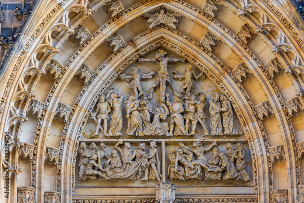 Portal of the main entrance of Saint Vitus Cathedral, representing the crucifixion of Jesus Christ, Prague, Czech Republic