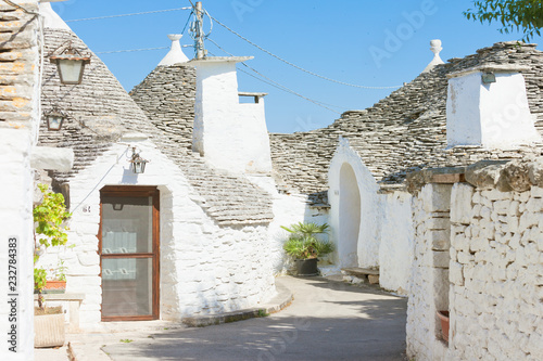 Fototapeta Naklejka Na Ścianę i Meble -  Alberobello, Apulia - Trulli within a very small alleyway