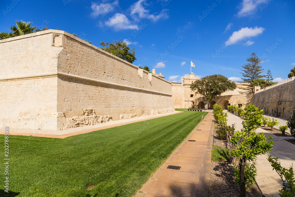 Mdina, Malta. Former fortress moat turned into a park, walls, gate, bridge