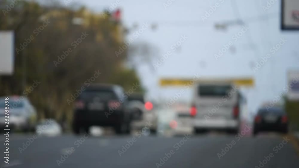 Blurred background of road with moving traffic. Blurred background of road with moving traffic.