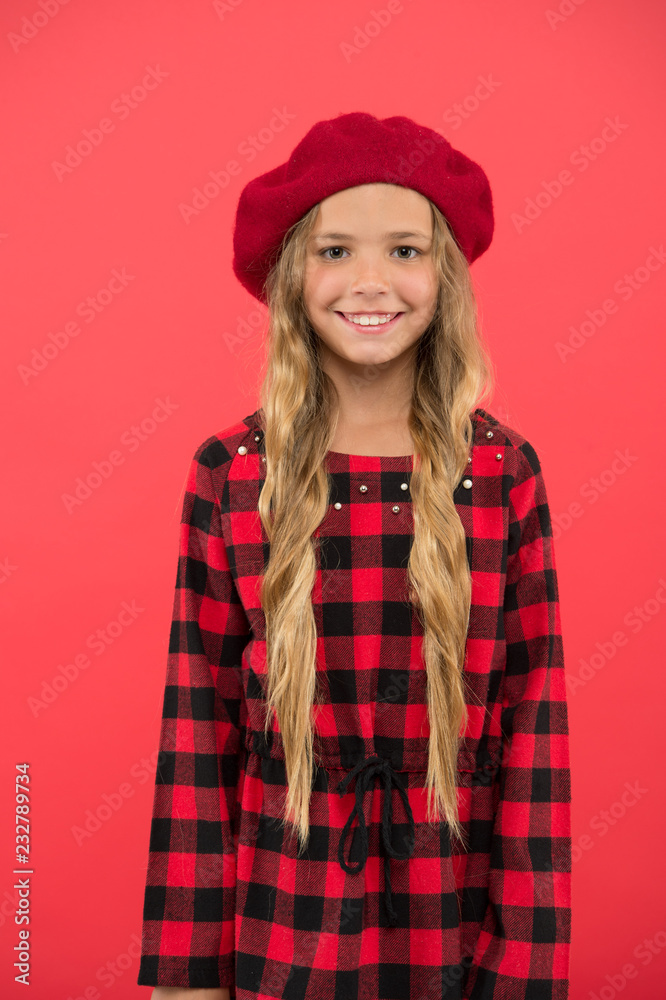 How to wear beret like fashion girl. Kid little cute girl with long hair posing in hat red