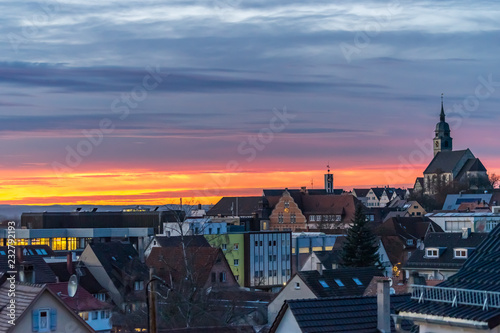 Aerial View of a Town in Germany with a Church and Sunset