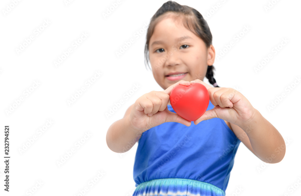 Cute asian girl show little red heart in hand isolated Cute asian girl show little red heart in hand isolated