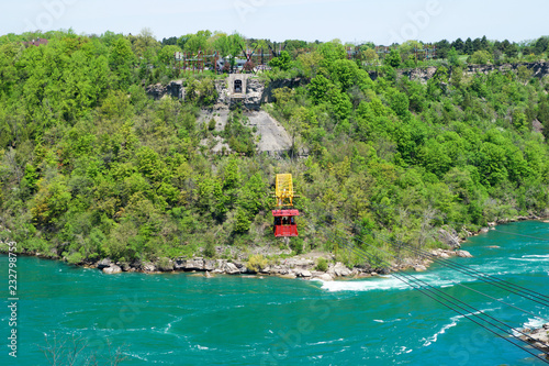 NIAGARA FALLS, ONTARIO, CANADA - MAY 21st 2018: Whirlpool Aero car carrying riders across the Niagara Whirlpool