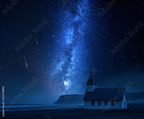 Fotografiet Milky way over small church on the beach, Iceland