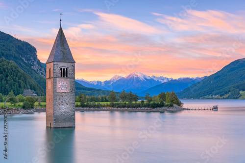 Resia Lake at sunrise.Europe, Italy, Trentino Alto Adige, South tyrol, Curon Venosta, Venosta valley photo