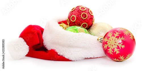 Christmas ball in the hat of Santa Claus