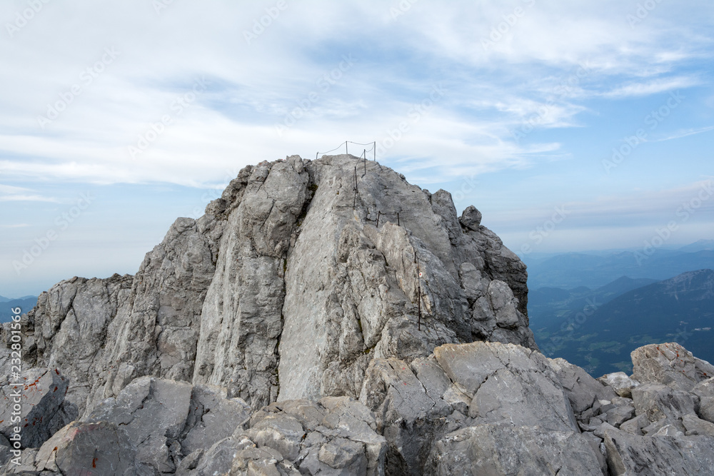 peak of the mountain with steel railing