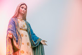 Virgin Mary statue with colourful background, Jesus christ mother.