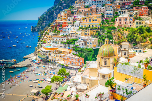 view of Positano town and beach - famous old italian resort at summer, Italy, retro toned photo