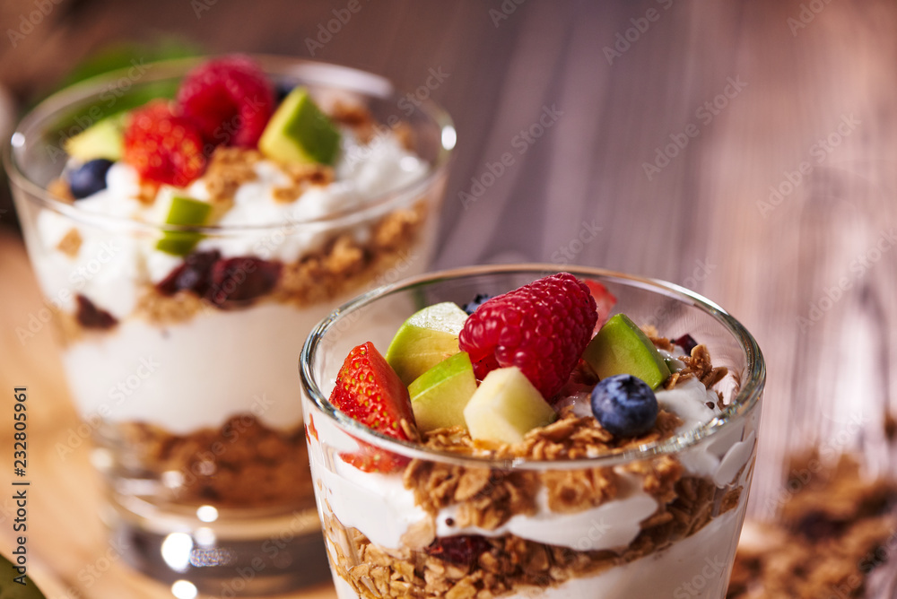 Close-up view of two glasses of delicious yogurt fruits