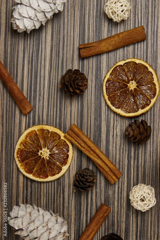 Christmas composition with spices and branches on wood Christmas composition with spices and branches on wood