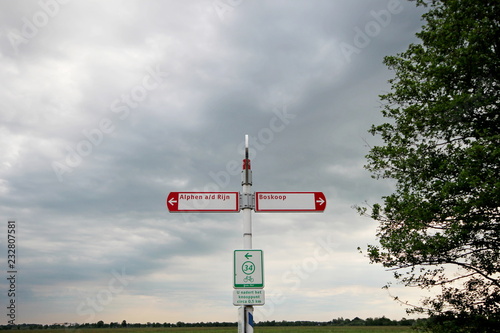 Cycle lane direction signs to city of Boskoop and Alphen aan den Rijn. photo