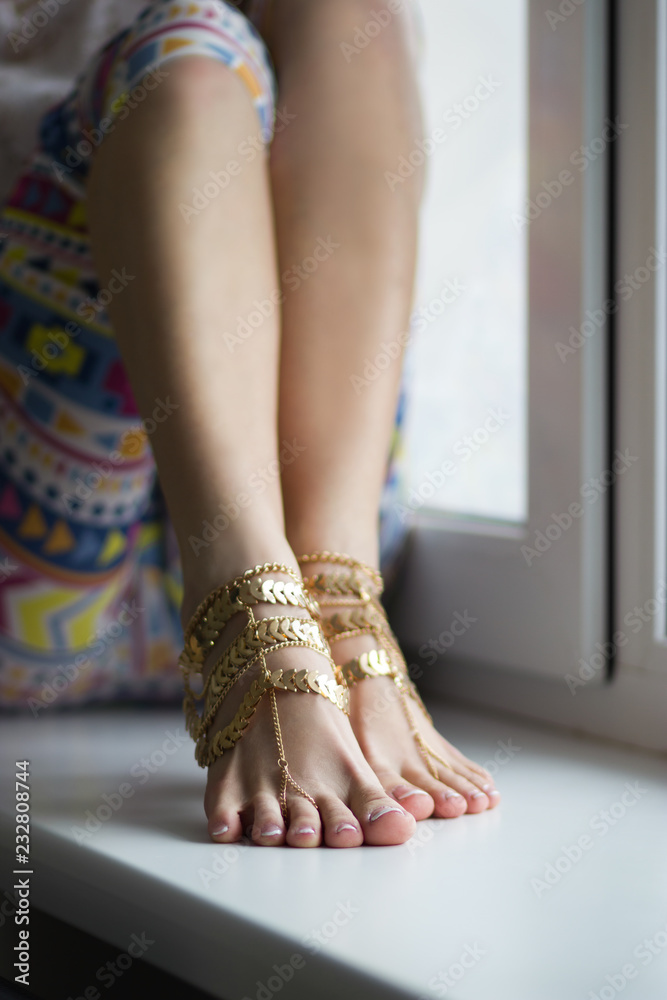 Studio shot of sexy female feet with foot jewelry Stock Photo | Adobe Stock
