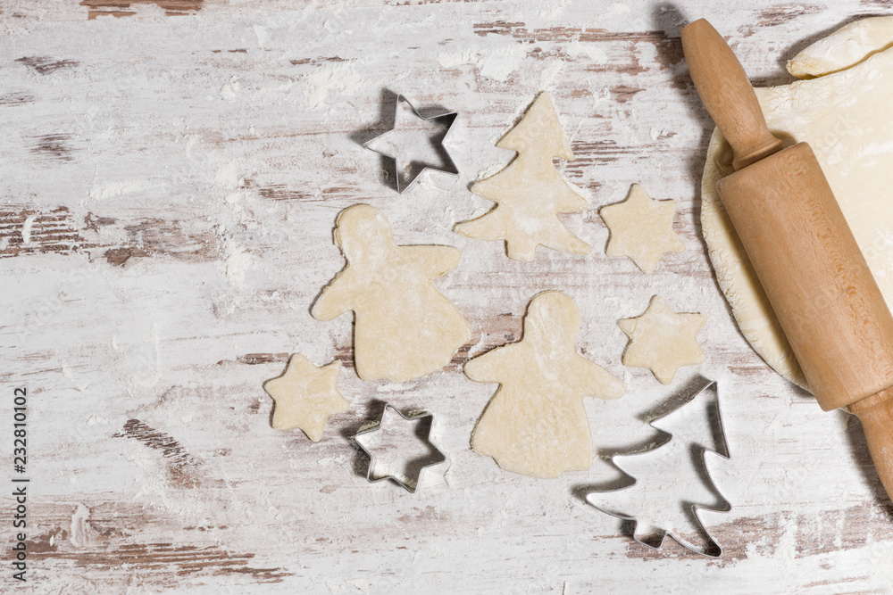 dough for baking Christmas cookies on wooden table, top view dough for baking Christmas cookies on wooden table, top view