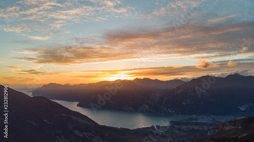 sunset in the mountains over a lake