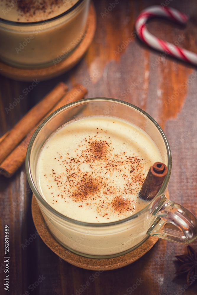 Two Glass of Eggnog with Cinnamon and Nutmeg for the Christmas Two Glass of Eggnog with Cinnamon and Nutmeg for the Christmas