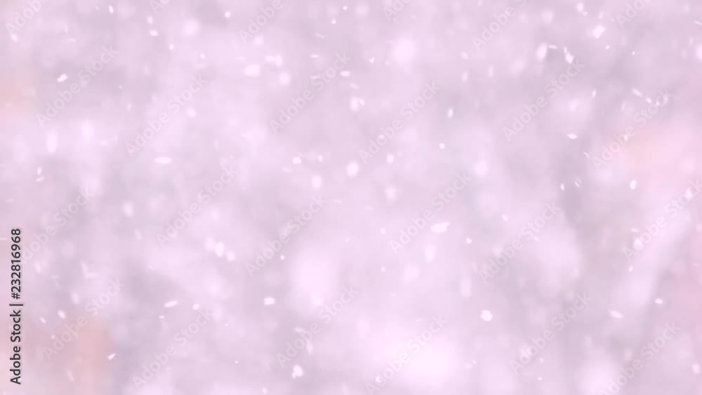 Snow falling down against blurred background. Abstract winter backdrop with falling snowflakes in pink shades. Snow falling down against blurred background. Abstract winter backdrop with falling snowflakes in pink shades.